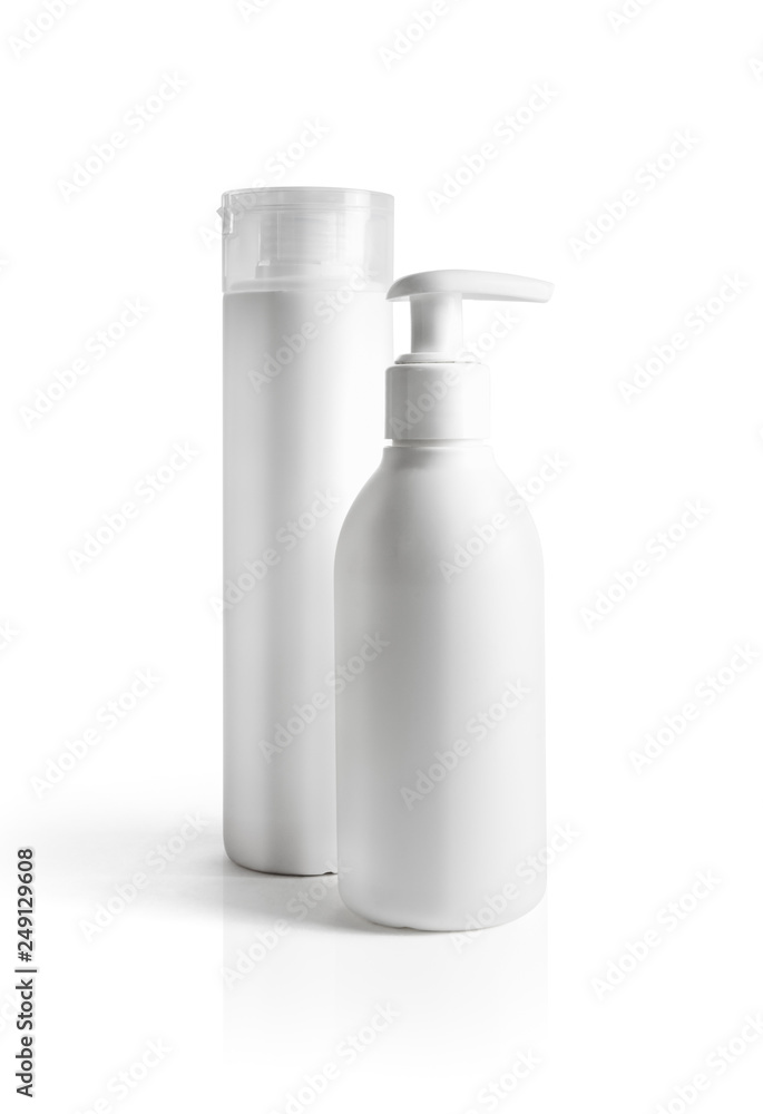 Blank cosmetic containers on white background. Isolated with clipping path. Dispenser and shaving gel. Blank cosmetic containers on white background. Isolated with clipping path. Dispenser and shaving gel.