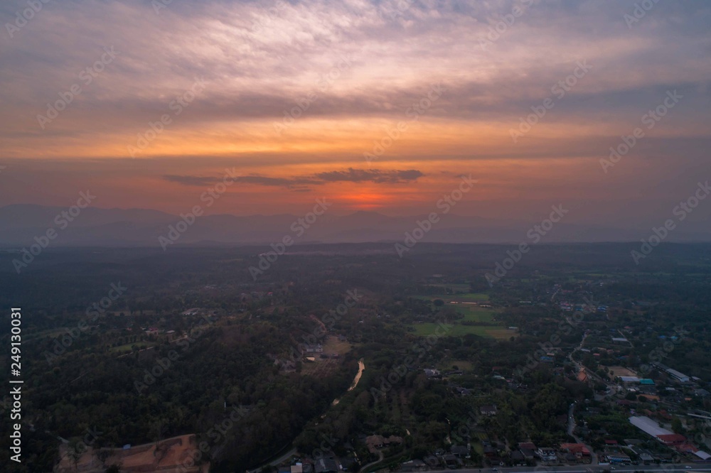 Sunset view from Drone, Thailand rural valley on the field.