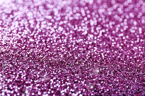 Texture of rose gold glitter as background, closeup