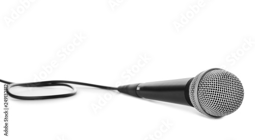 Professional dynamic microphone with wire on white background