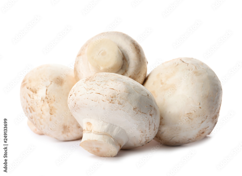 Fresh champignon mushrooms isolated on white. Healthy food