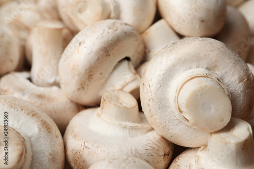 Fresh champignon mushrooms as background. Healthy food