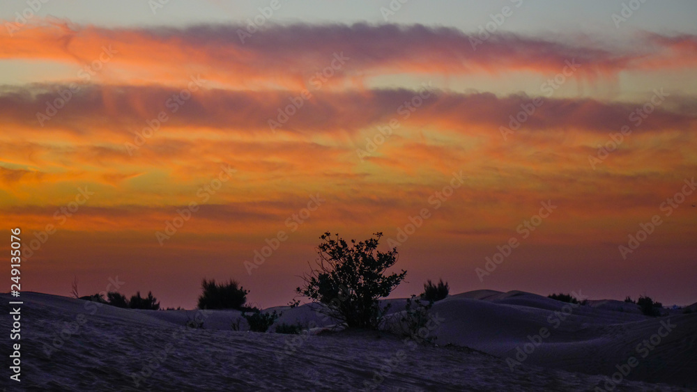 Colorful sunset in Dubai Desert