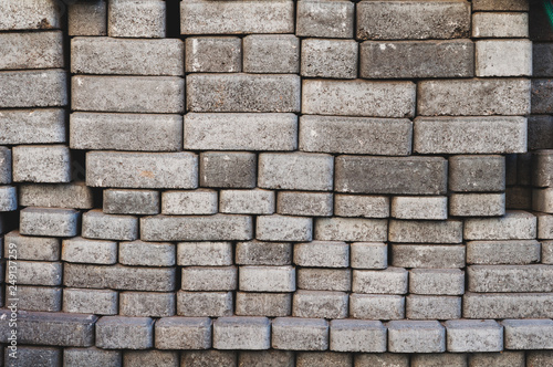 background of stacked paving slabs with a rough gray surface