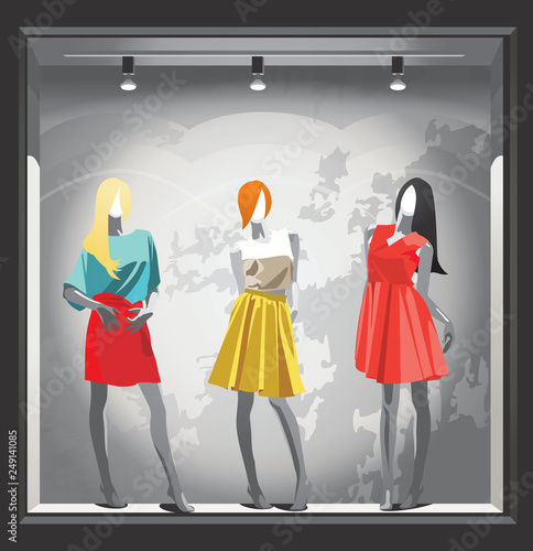 Female mannequins in bright summer clothes.