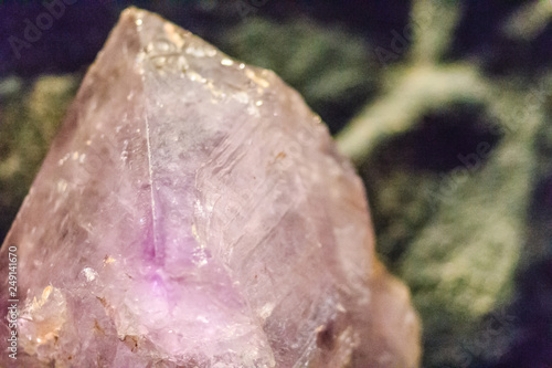 Purple Amethyst rock specimen from mining and quarrying industries. Amethyst is a violet variety of quartz often used in jewelry.