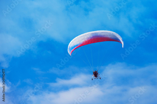 Paragliding in Altai mountains. Paragliders in fight in the mountains, concept of extreme sport activity.