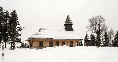 wooden church on Stecowka in winter Beskid Slaski mountains in Poland