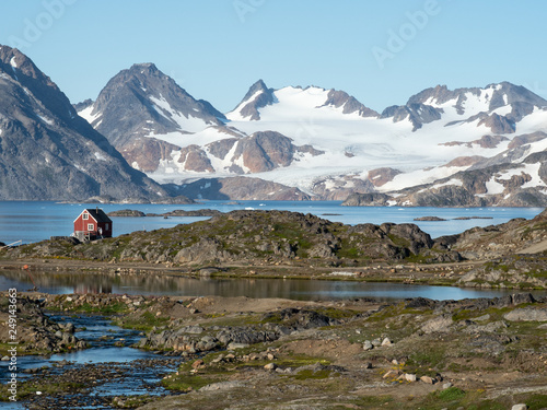 small house with mountains