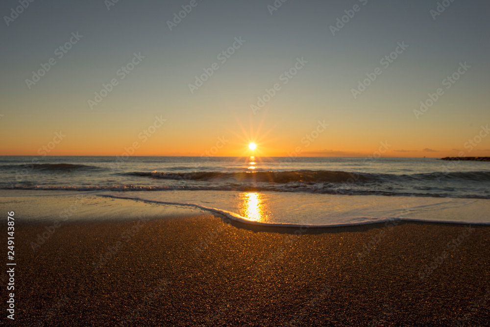 Sunrise on a beach in Denia, Alicante