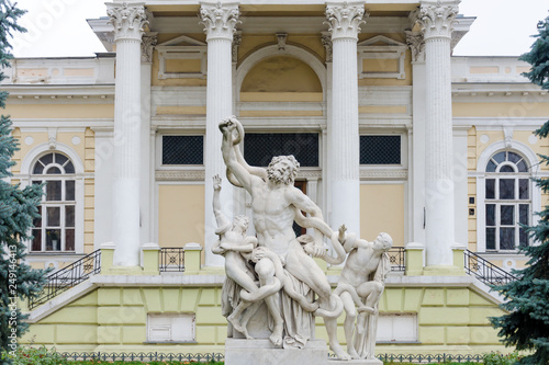 Statue of Laocoon and his Sons, the Laocoon Group, monumental marble sculpture. Statue in municipal park of Odessa near Archaeological Museum photo