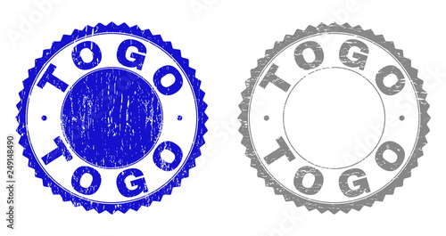 Grunge TOGO stamp seals isolated on a white background. Rosette seals with grunge texture in blue and gray colors. Vector rubber stamp imitation of TOGO title inside round rosette.