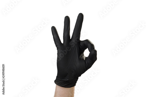 Male hand in black rubber gloves, symbol, sign or gesture. On a white isolate background.