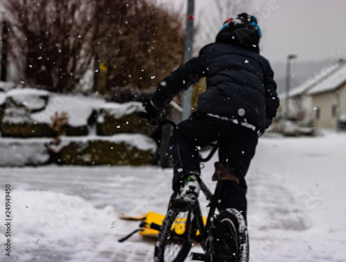 fun with his bmx in the snow