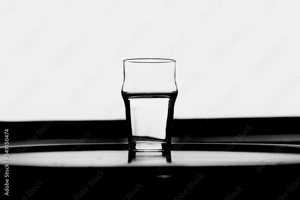 glass of water on black background glass of water on black background