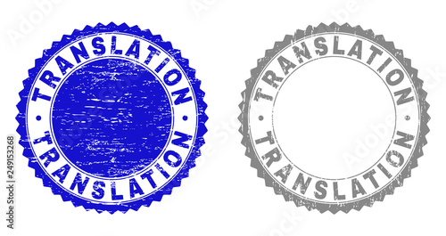 Grunge TRANSLATION stamp seals isolated on a white background. Rosette seals with grunge texture in blue and gray colors. Vector rubber stamp imprint of TRANSLATION title inside round rosette.