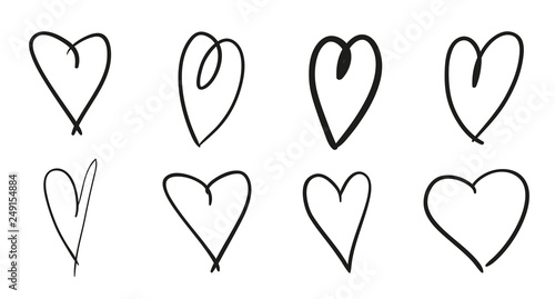 Hand drawn grunge hearts on isolated white background. Set of love signs. Unique image for design. Black and white illustration. Sketchy elements for design