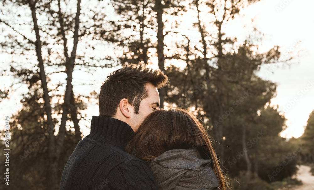 Couple of guy and girl hugged and happy in the field.Photo style social networks and vintage Couple of guy and girl hugged and happy in the field.Photo style social networks and vintage
