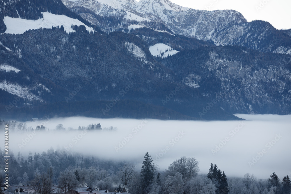 foggy valley in bavarian mountains, alps