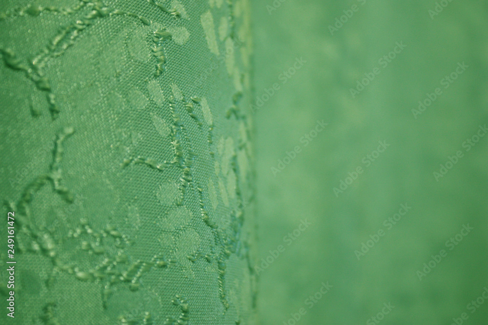 Obraz premium green curtains with a blurred background and pattern