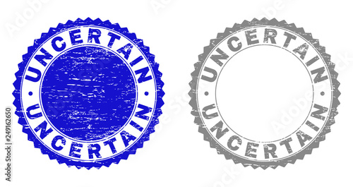 Grunge UNCERTAIN stamp seals isolated on a white background. Rosette seals with grunge texture in blue and gray colors. Vector rubber stamp imprint of UNCERTAIN tag inside round rosette.