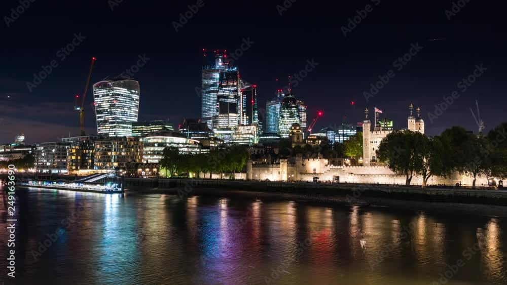 North bank of the River Thames, The Tower of London and The City skyscrapers, night illumination, time lapse. North bank of the River Thames, The Tower of London and The City skyscrapers, night illumination, time lapse.