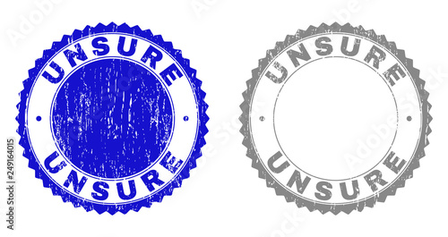 Grunge UNSURE stamp seals isolated on a white background. Rosette seals with grunge texture in blue and grey colors. Vector rubber stamp imitation of UNSURE title inside round rosette.