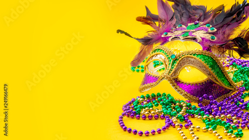 Photographie Happy Mardi Gras and Fat Tuesday carnival concept with close up on a face mask f