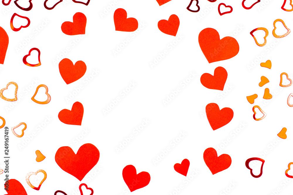 Heart-shaped confetti on white background.