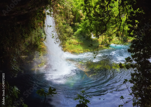 Jungle beautiful waterfall Mountain river stream - Landscape waterfall front of the cave green forest nature plant tree rainforest with rock stone © Ryzhkov Oleksandr