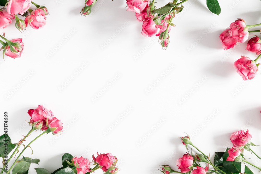 Flowers composition romantic. Pink rose flowers on white background. Valentine's Day, Easter, Birthday, Happy Women's Day, Mother's day. Flat lay, top view, copy space