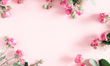 Flowers composition romantic. Pink rose flowers on pastel pink background. Valentine's Day, Easter, Birthday, Happy Women's Day, Mother's day. Flat lay, top view, copy space, banner