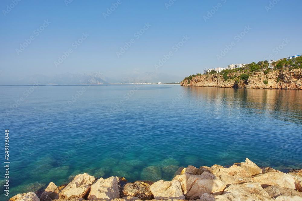 Panorama of Antalya coast from the tall cliff with Mermerli beach, Turkey.