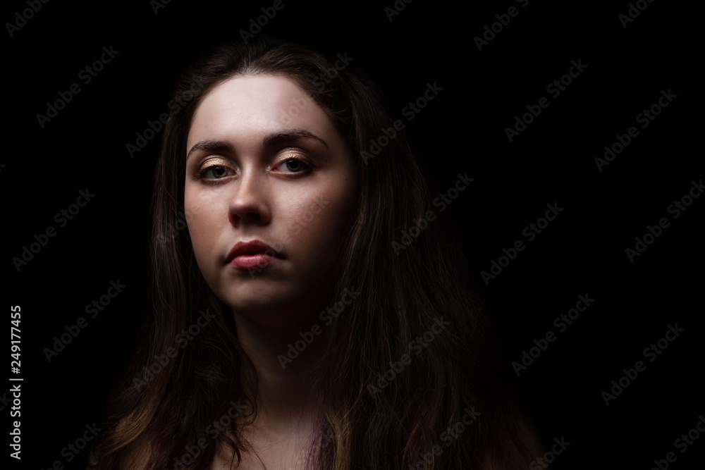 beautiful girl on black background with copy space beautiful girl on black background with copy space