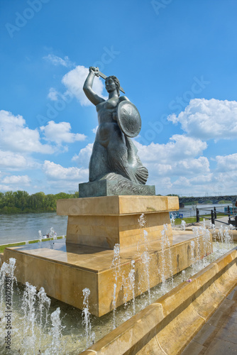 The Warsaw Mermaid called Syrenka on the Vistula River bank in Warsaw