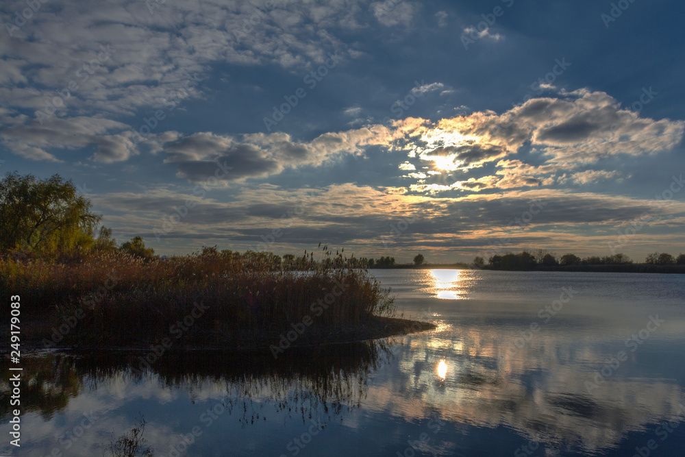 Fototapeta premium sunset over lake