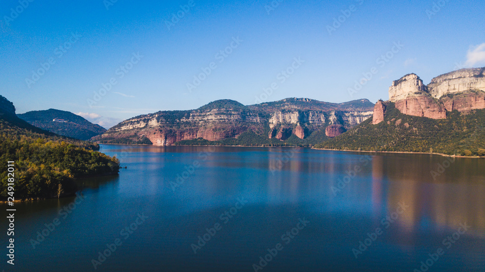 Sau Reservoir aerial drone view in summer (Province of Osona, Catalonia, Spain).
