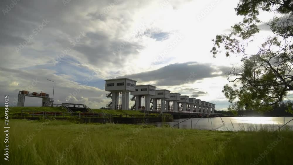 Time lapse water barrier with cloud sky over the sun Time lapse water barrier with cloud sky over the sun