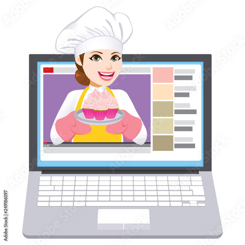 Young chef woman making video blog holding tray with strawberry cupcakes