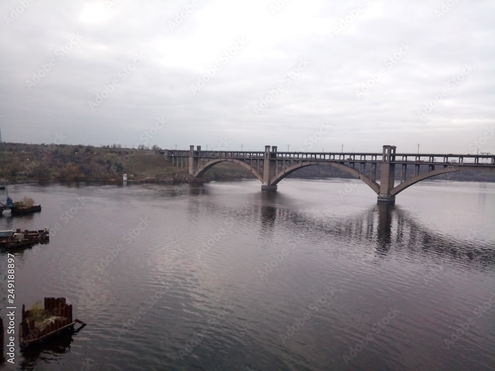 Fototapeta premium bridge river road landscape columns architecture clouds weather gray Weekdays days days