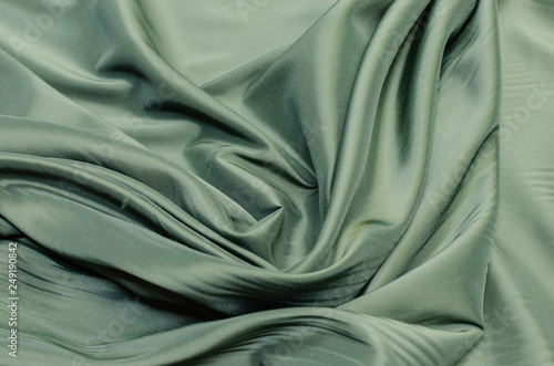Fotografie Lining fabric of viscose, acetate and elastane green
