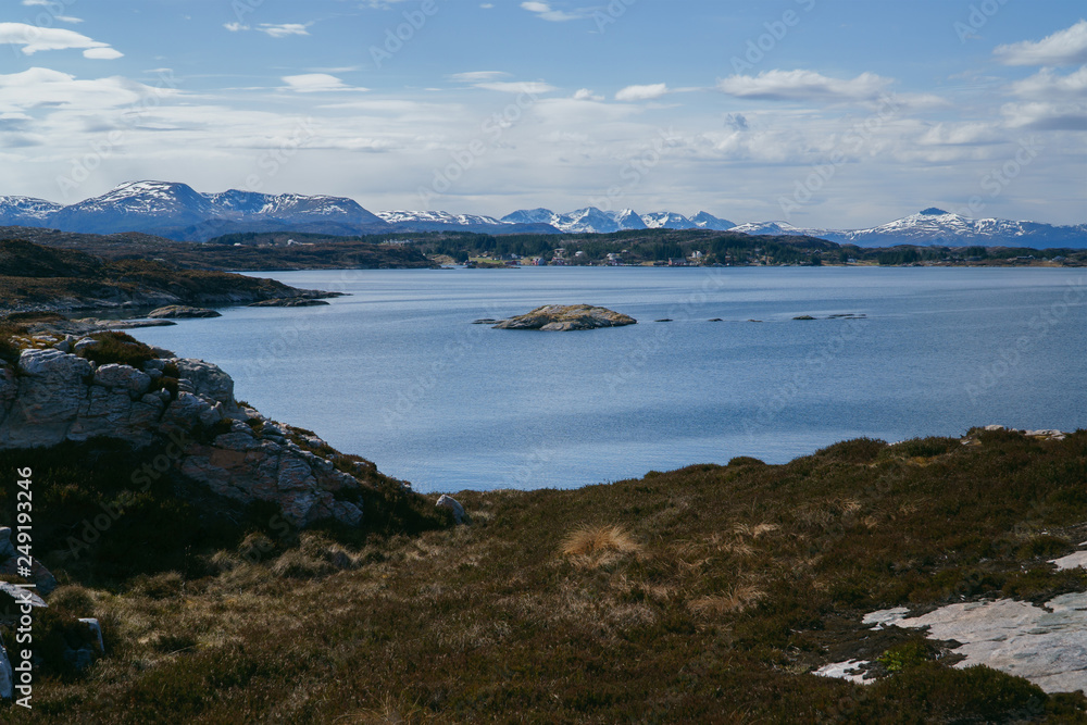Rocky coast and Atlantic ocean, Beautiful landscape near Atlantic road in Norway in bright spring day. Rocky coast and Atlantic ocean, Beautiful landscape near Atlantic road in Norway in bright spring day.