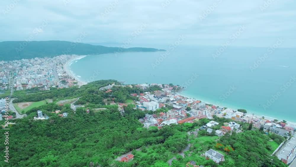 Aerial view to Praia de Bombas and Praia de Bombinhas beaches on a cloudy day. Bombinhas - SC, Brazil. Aerial view to Praia de Bombas and Praia de Bombinhas beaches on a cloudy day. Bombinhas - SC, Brazil.