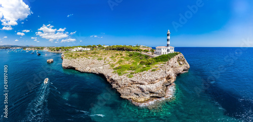 Spain, Baleares, Mallorca, Portocolom, Punta de ses Crestes, Bay of Portocolom and Cala Parbacana, Lighthouse photo