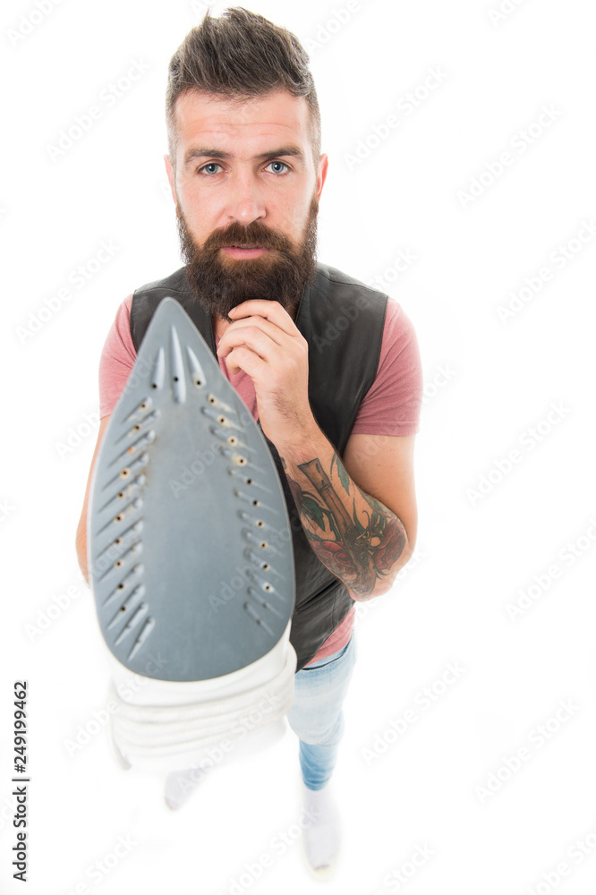 How to properly use steam iron. Man bearded hipster hold electric
