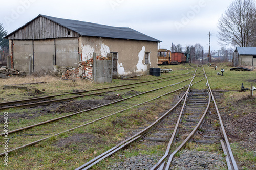 Old narrow-gauge railway tracks. Roundhouse in Central Europe.