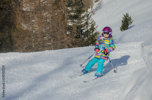 Stunning view of the mountains and child skier in Obertauern ski resort