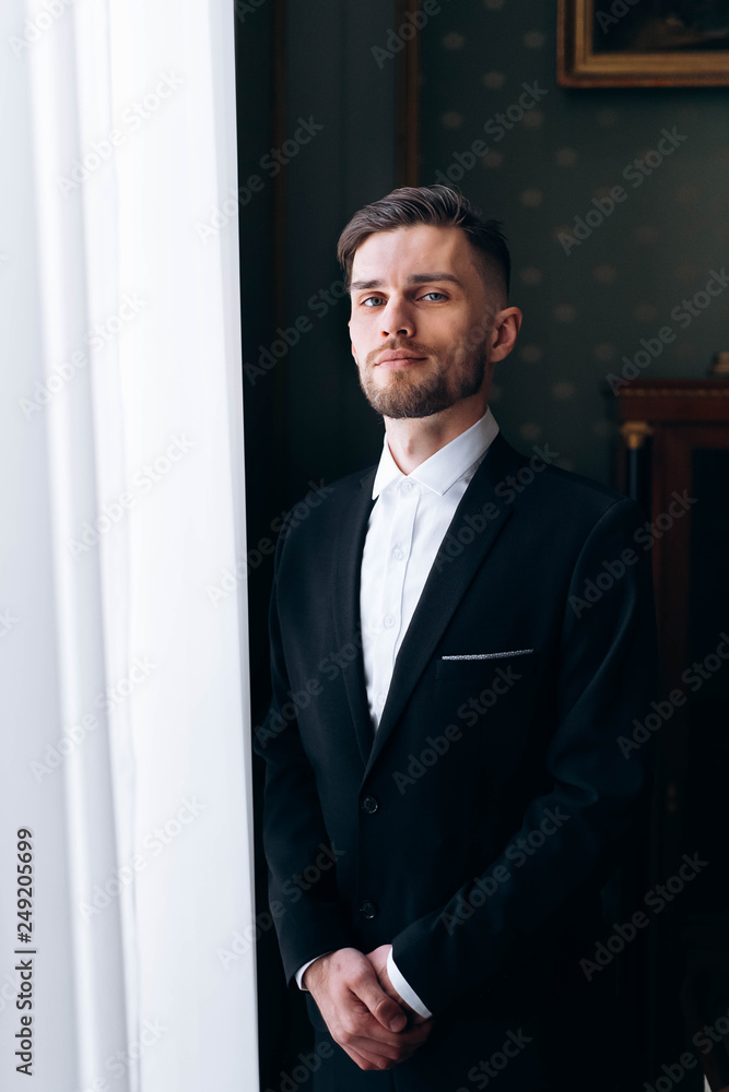 Portrait of handsome serious stylish groom Portrait of handsome serious stylish groom