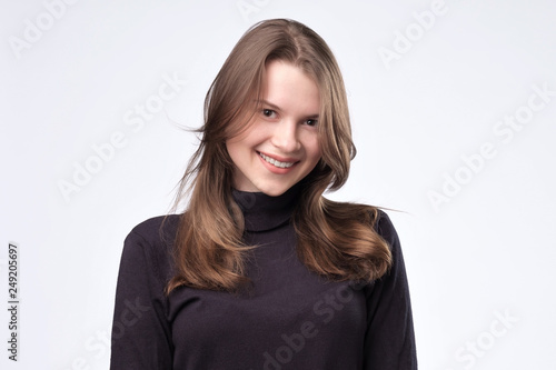 Young attractive girl whith long hair smiling © Viktor Koldunov