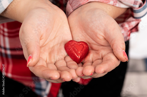 Chocolate Heart In The Hands Of A Child